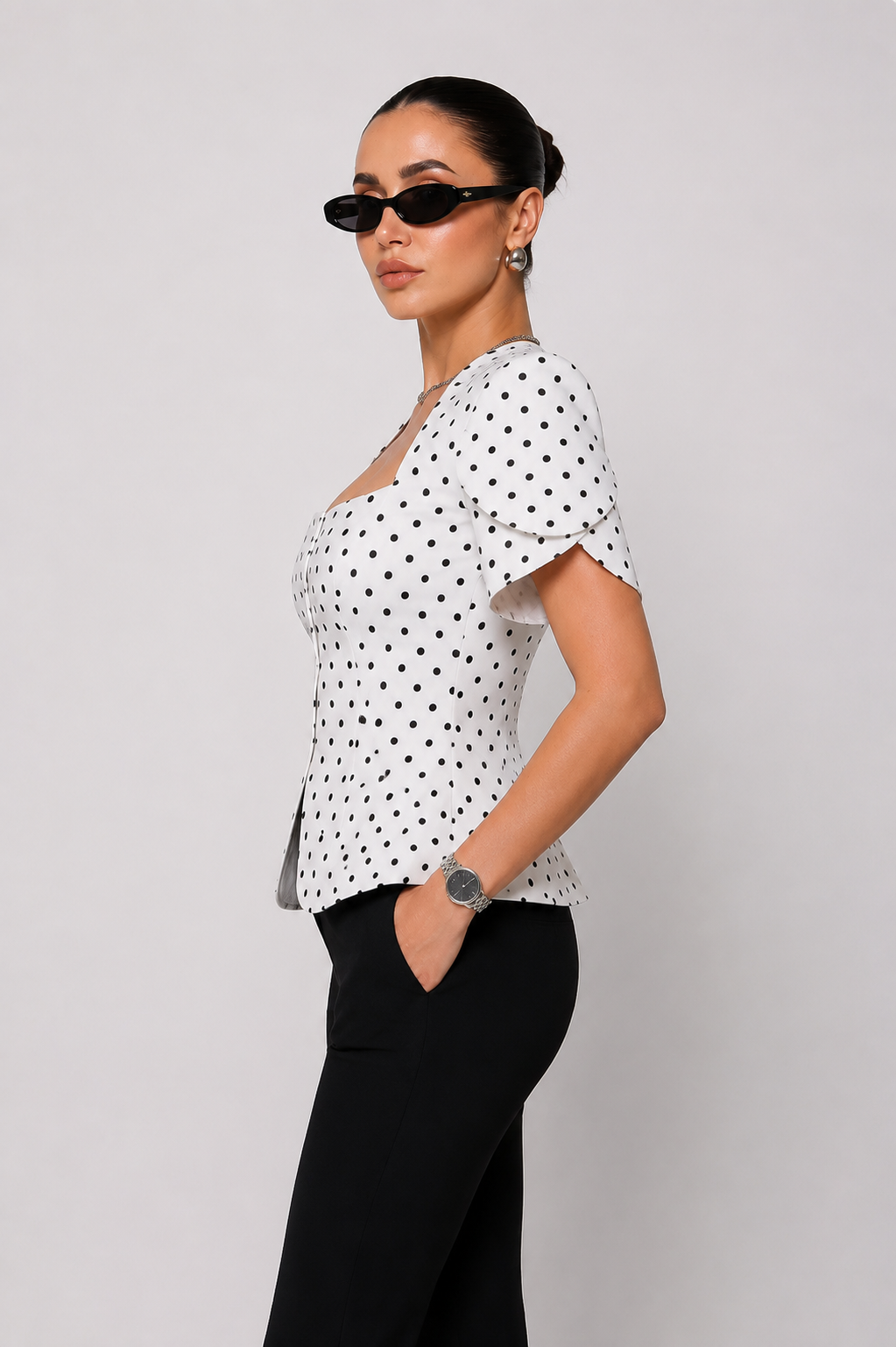 Polka Dot Sculpted Peplum Top